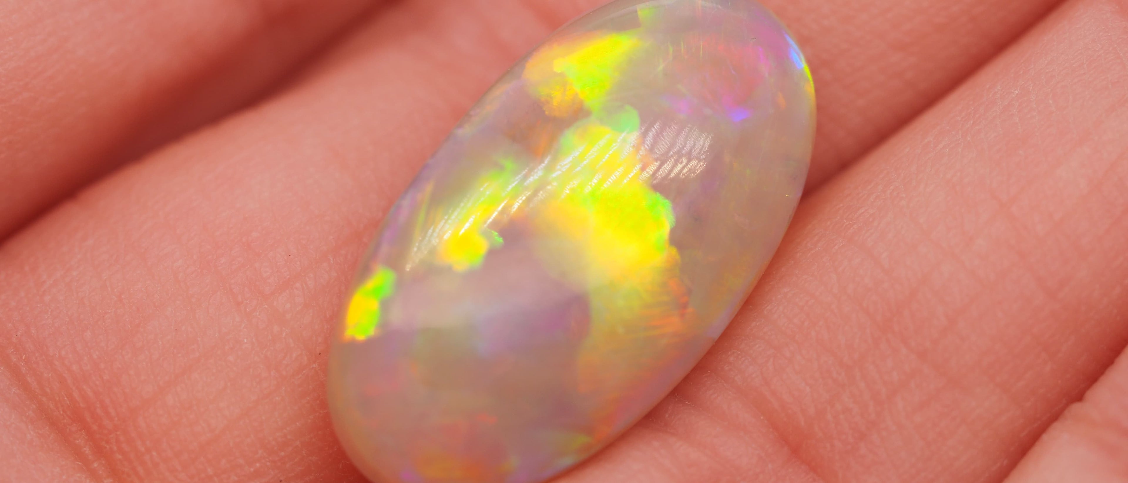 Australian fire opal in a hand